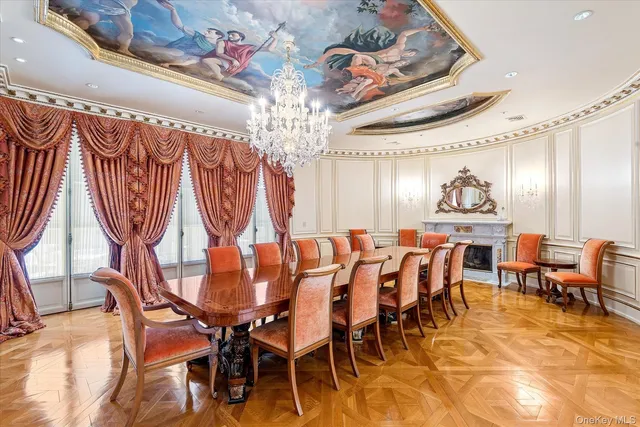 a room with lots of chairs and mirrors