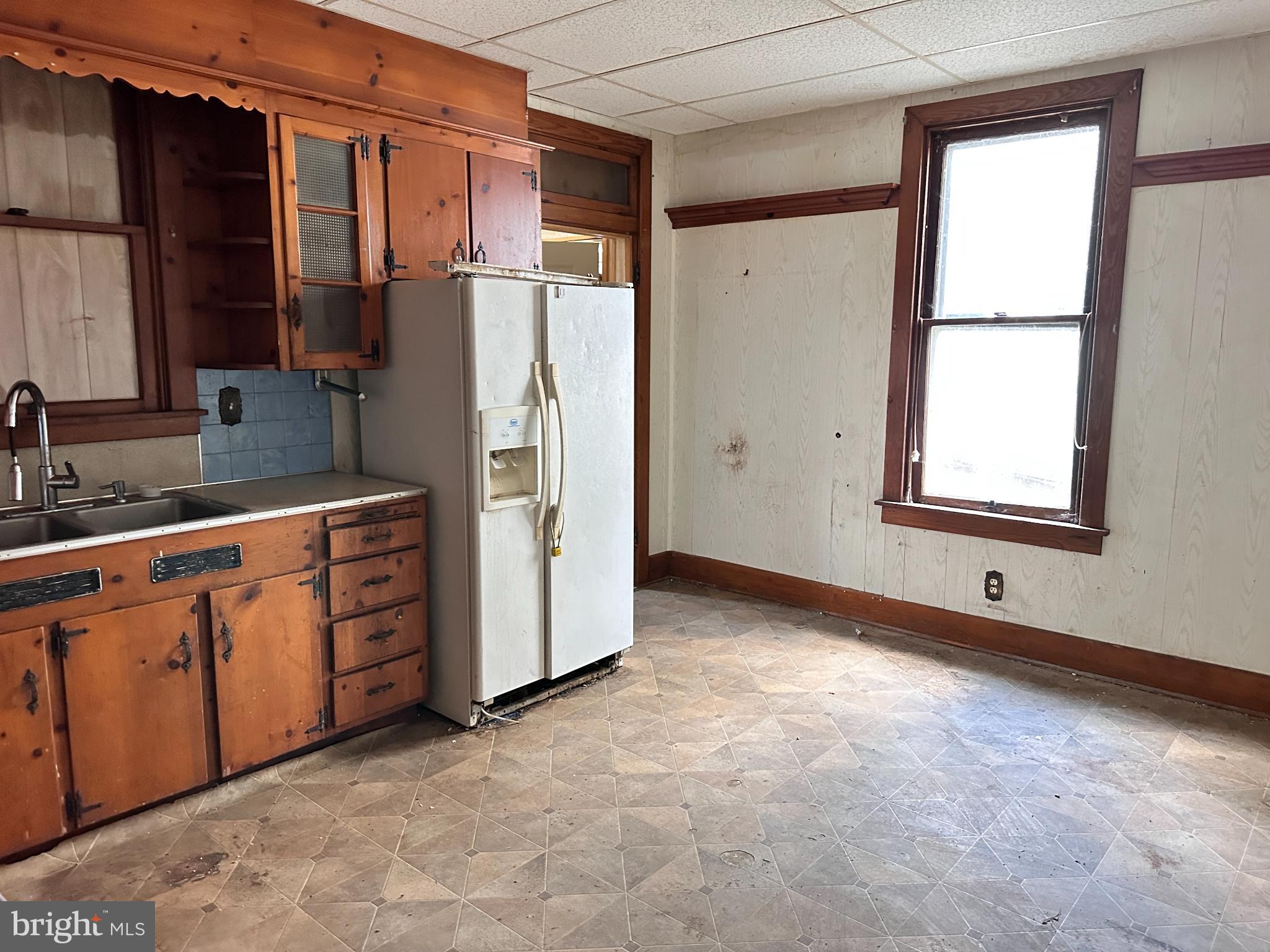 313 Park Avenue Lebanon, PA 17042 - Photo 9 of 22 a view of a kitchen with window and refrigerator