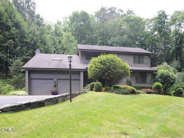 8 Cove Road Brookfield, CT 06804 - Photo 1 of 1 front view of a house with a yard