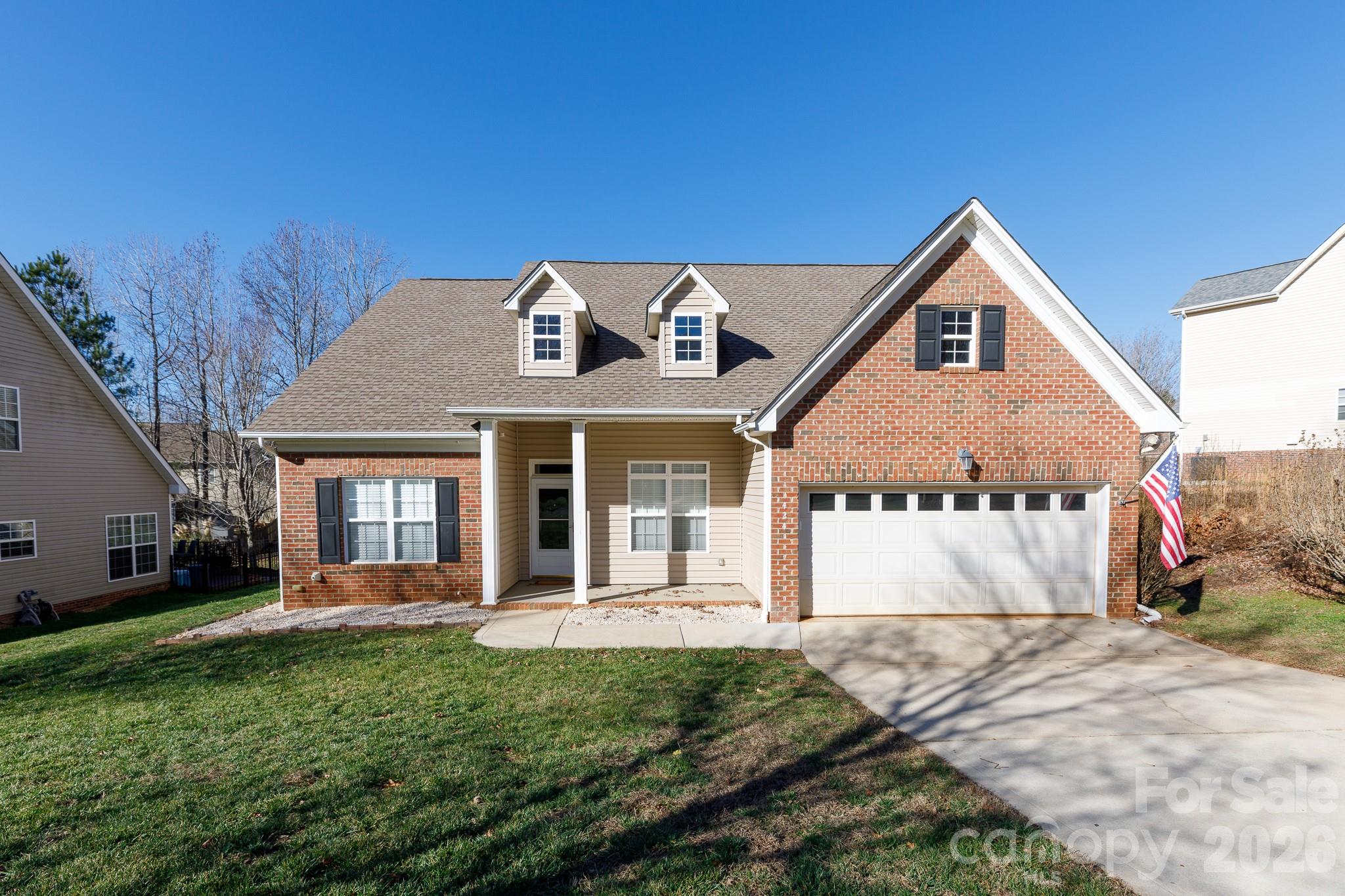 424 Elizabeth Valley Lane Clover, SC 29710 - Photo 1 of 27 a front view of a house with a yard