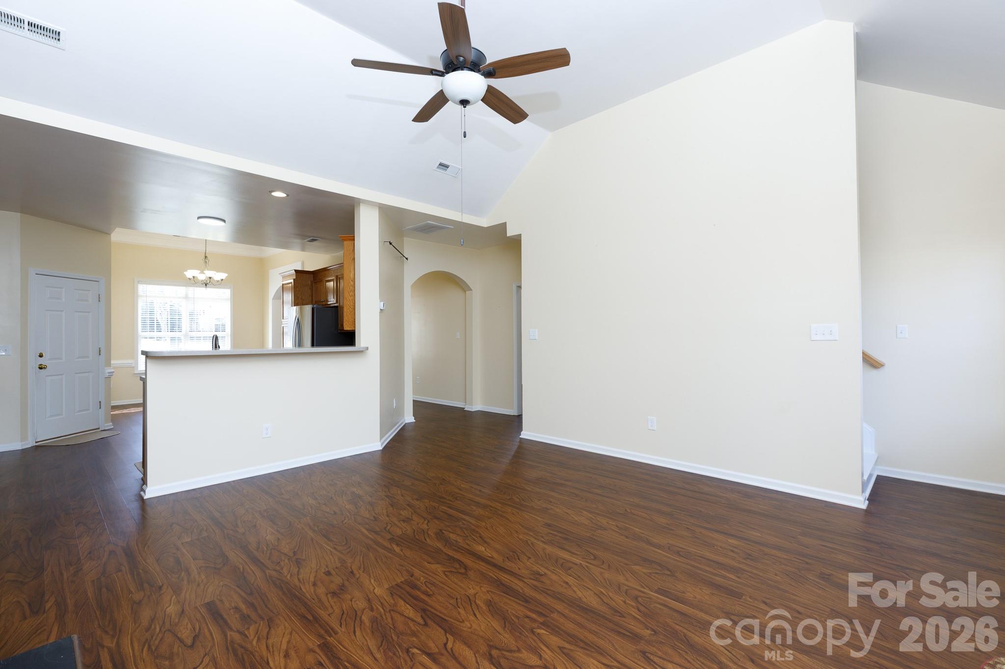 424 Elizabeth Valley Lane Clover, SC 29710 - Photo 13 of 27 a view of a kitchen with wooden floor and a ceiling fan