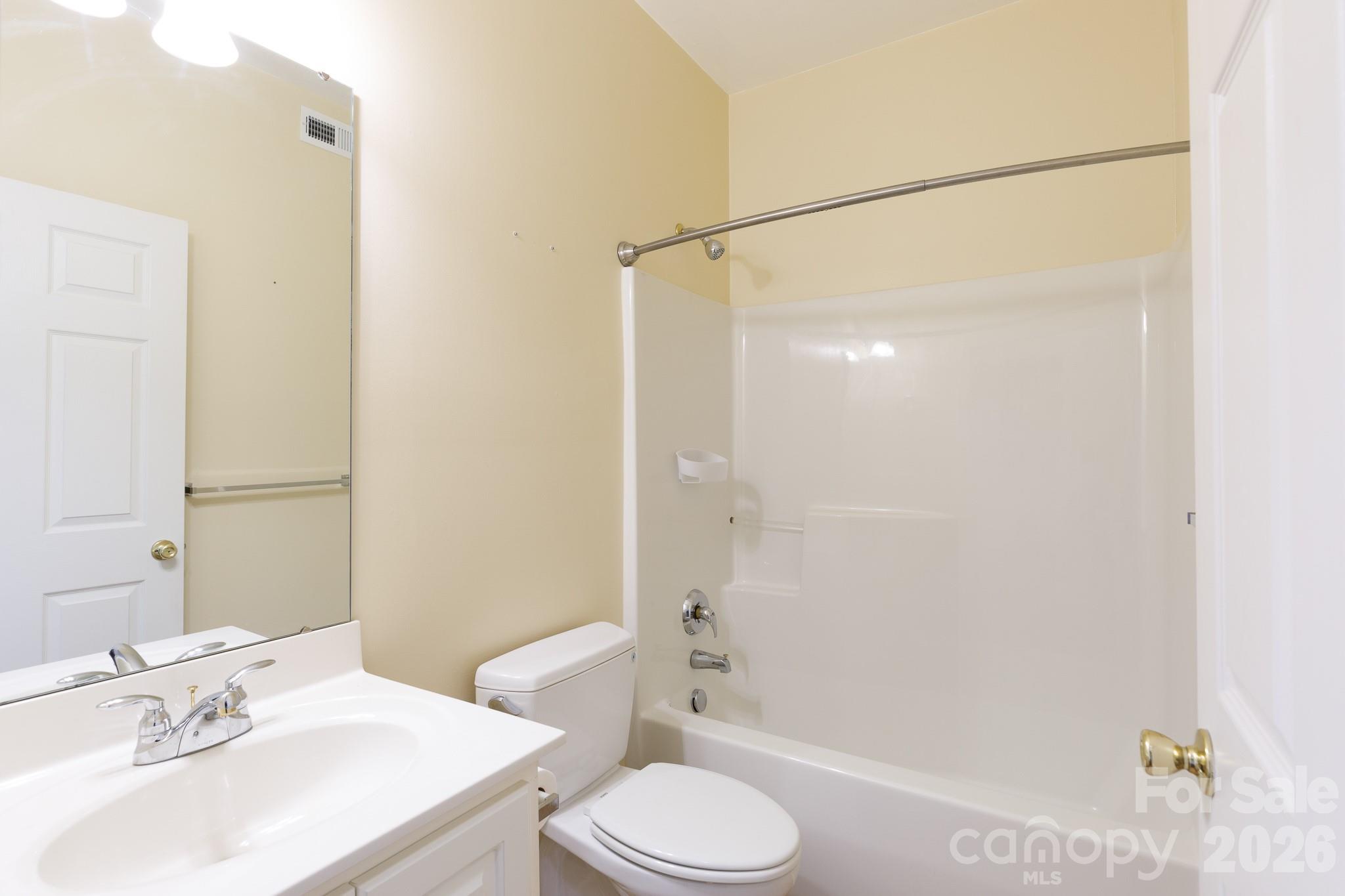 424 Elizabeth Valley Lane Clover, SC 29710 - Photo 22 of 27 a bathroom with a sink toilet and shower