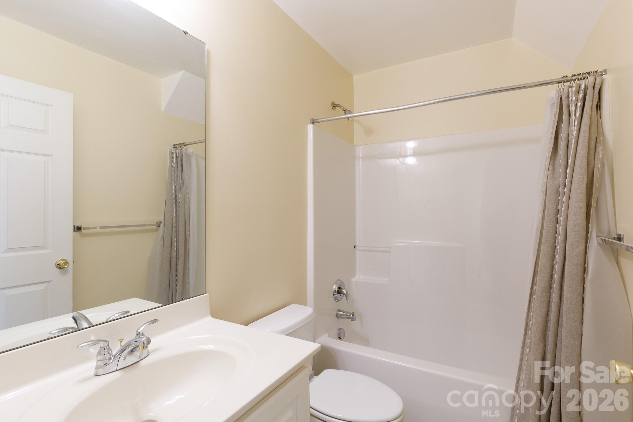 424 Elizabeth Valley Lane Clover, SC 29710 - Photo 25 of 27 a bathroom with a sink toilet and shower
