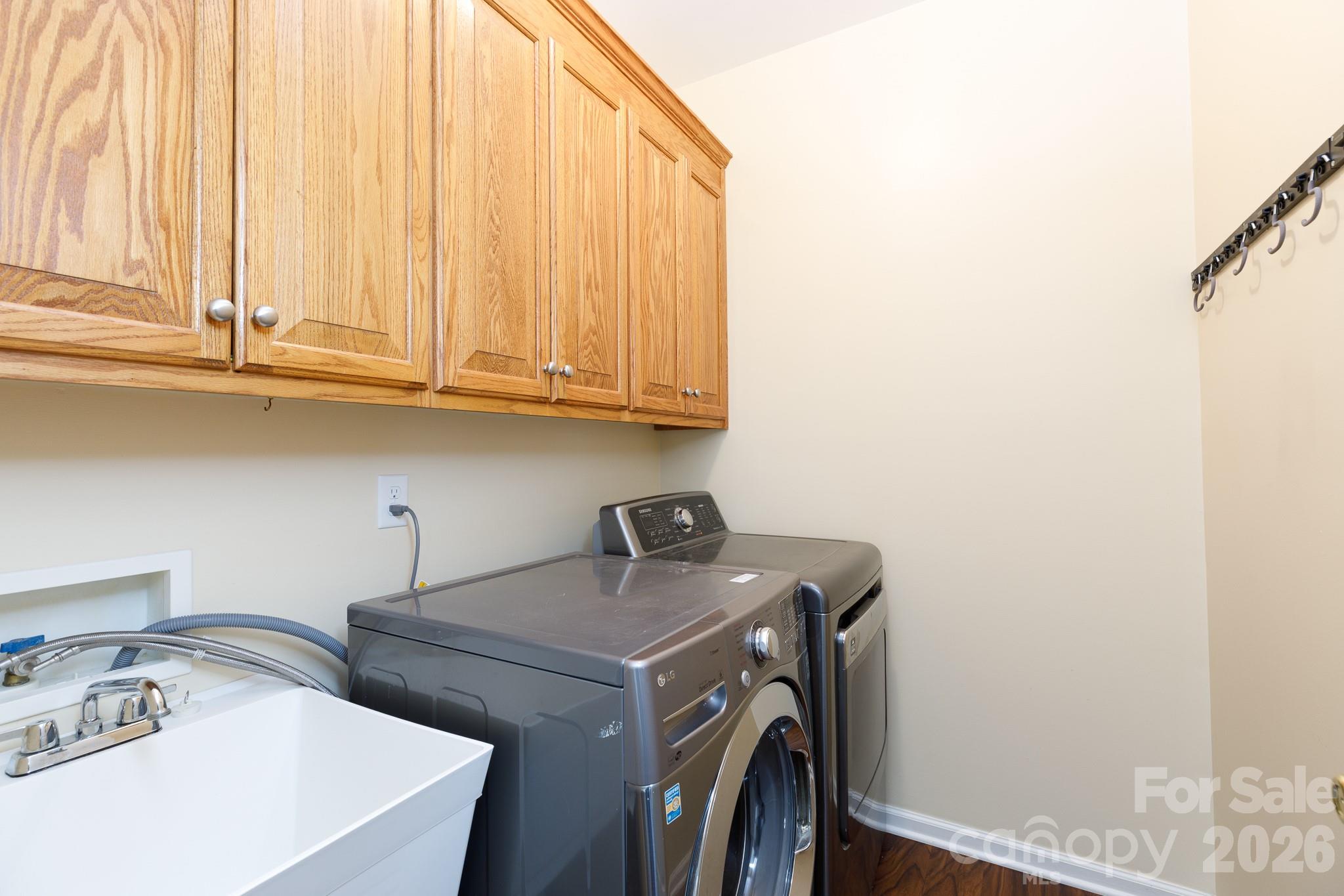 424 Elizabeth Valley Lane Clover, SC 29710 - Photo 7 of 27 a utility room with dryer and washer