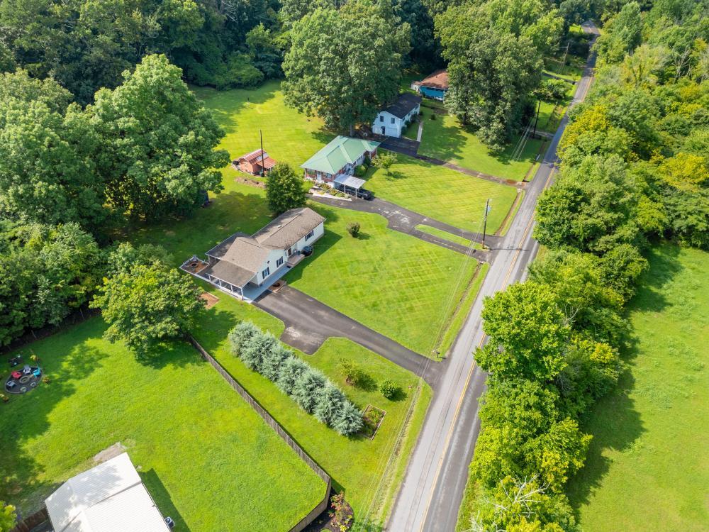 729 Minnis Road Cleveland, TN 37323 - Photo 3 of 40 2024_07_July_729_Minnis_Rd_NE_0017