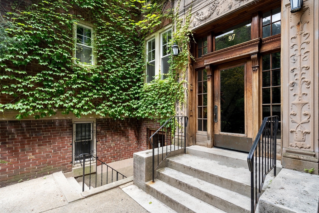 97 Chester Street, Unit 8 Boston, MA 02134 - Photo 2 of 19 a front view of a house with a tree