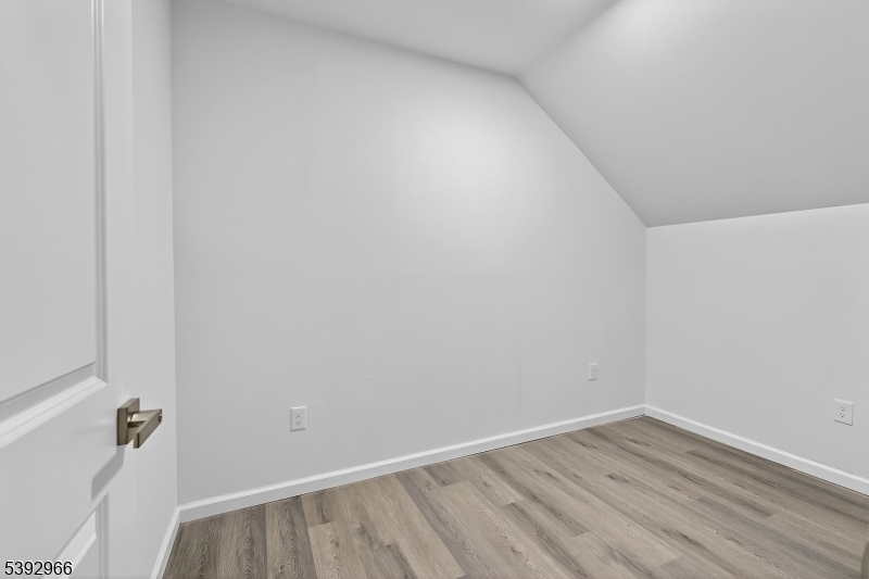 238 Renner Avenue Newark, NJ 07112 - Photo 23 of 30 a view of small space with wooden floor