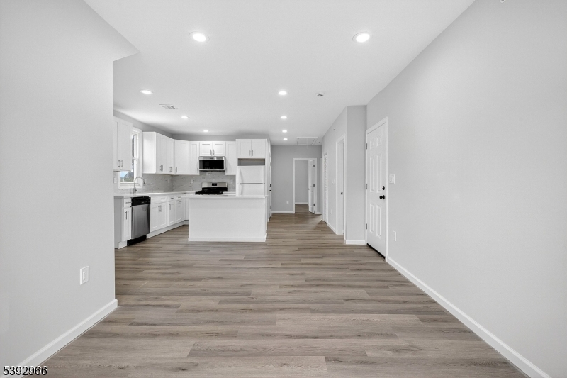 238 Renner Avenue Newark, NJ 07112 - Photo 4 of 30 a view of kitchen with wooden floor