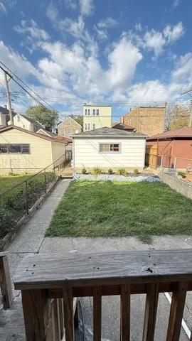 a view of a terrace with a yard