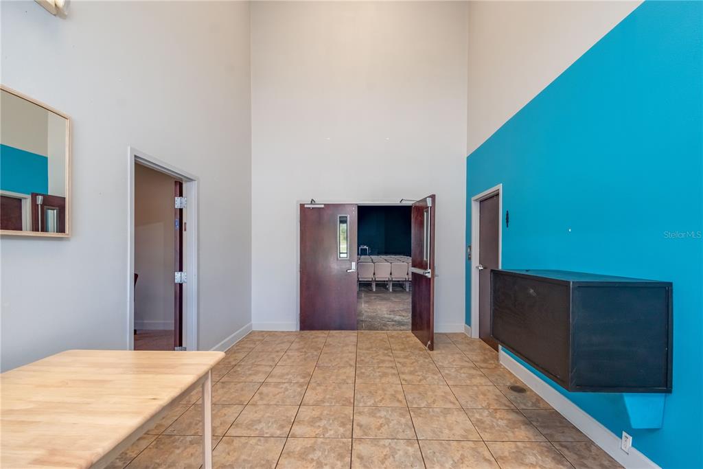 15 Ruckert Circle DeLand, FL 32720 - Photo 33 of 61 a bedroom with a bed and a television
