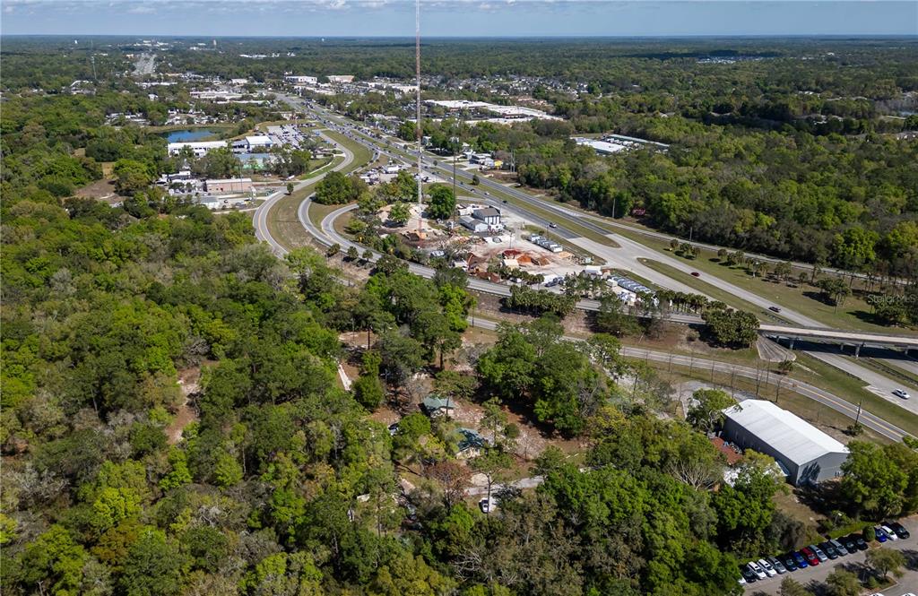 15 Ruckert Circle DeLand, FL 32720 - Photo 50 of 61 an aerial view of residential houses with outdoor space and trees
