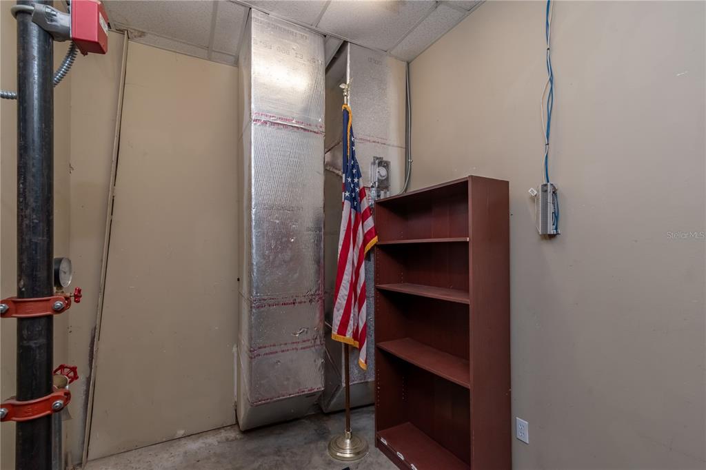 15 Ruckert Circle DeLand, FL 32720 - Photo 9 of 61 a view of walk in closet with clothes and shoes