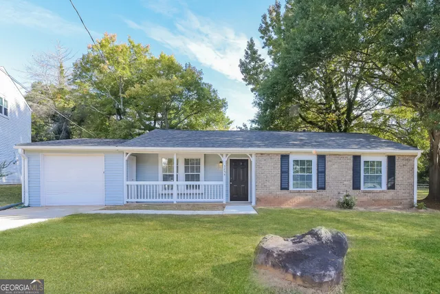 a backyard of a house with seating space