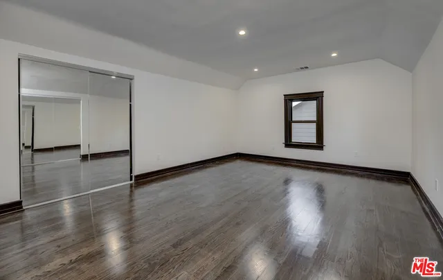 a view of a livingroom with wooden floor