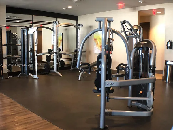 a view of a room with gym equipment