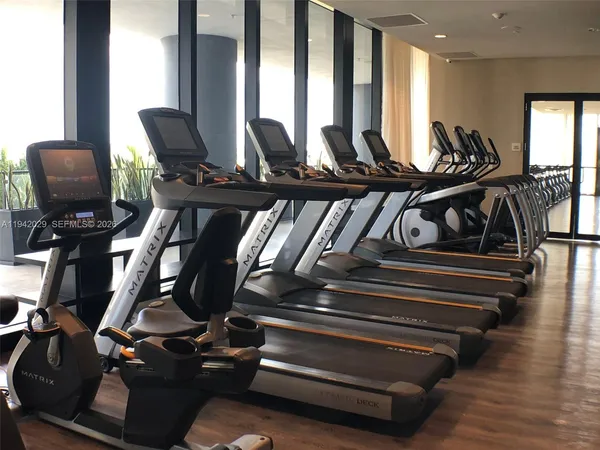 a view of a room with gym equipment