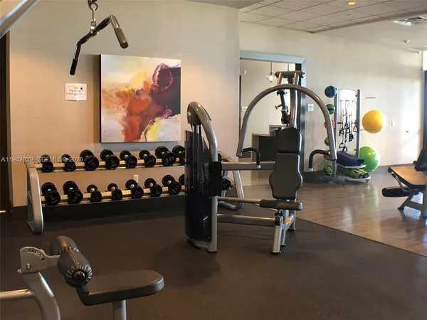 a view of a room with gym equipment
