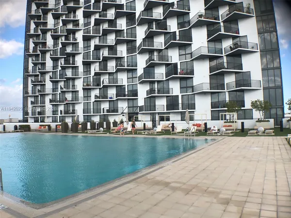 a view of a swimming pool and outdoor space