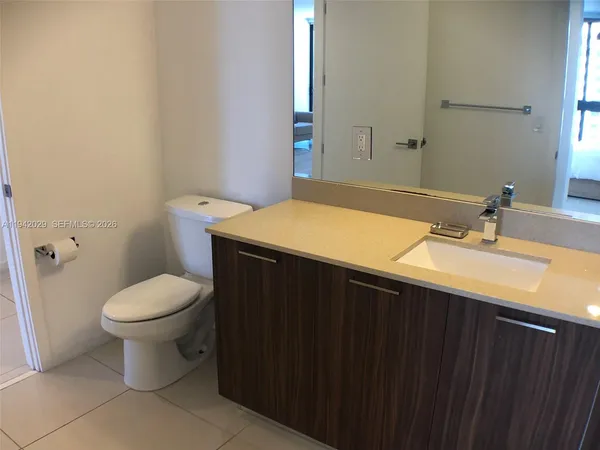 a bathroom with a sink and a toilet