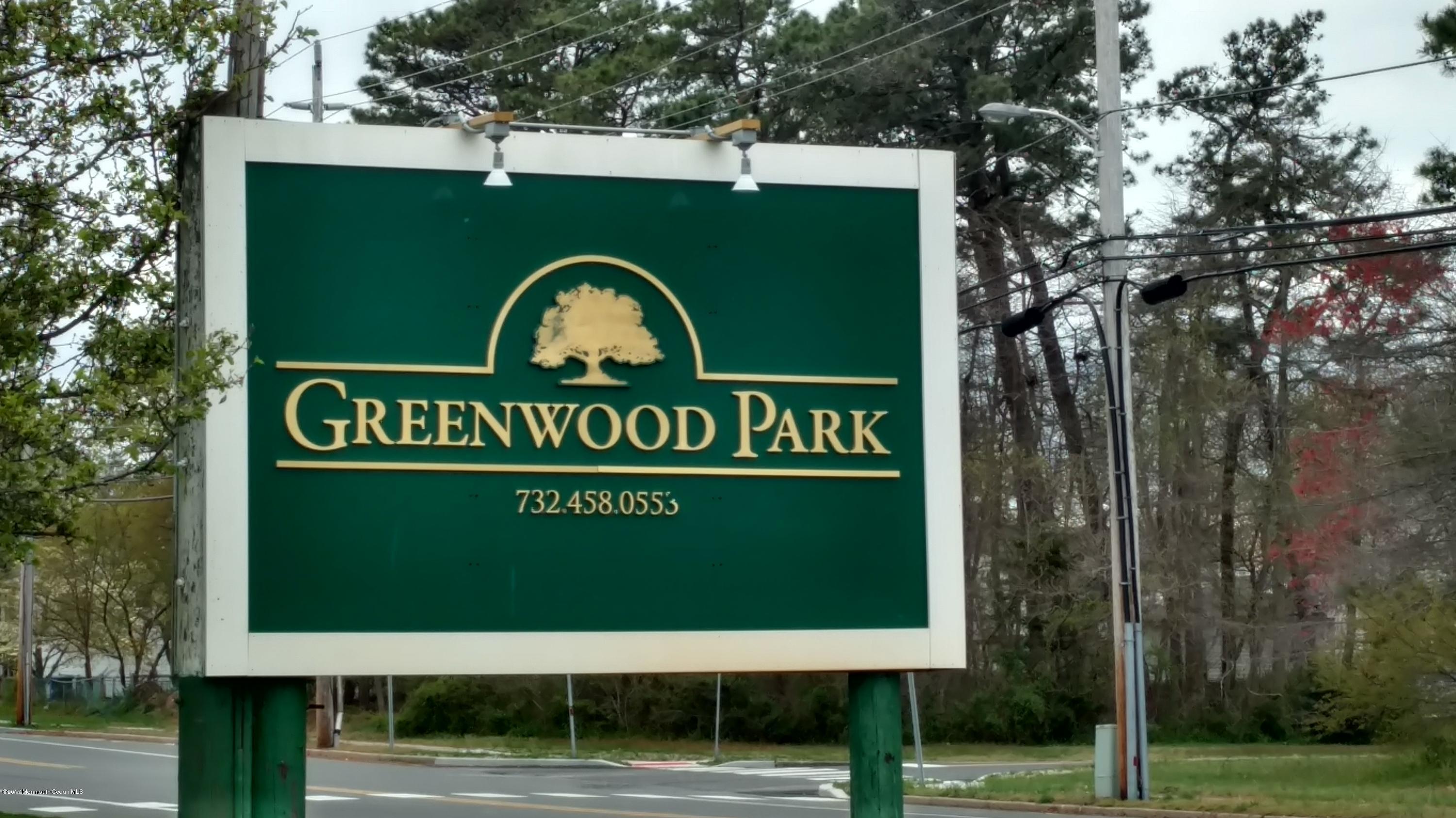 296 Greenwood Loop Road Brick, NJ 08724 - Photo 10 of 15 a view of outdoor space with sign board