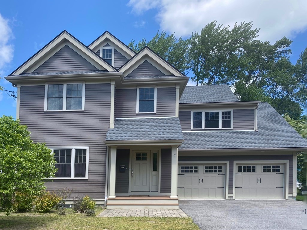 17 Barbara Road Newton, MA 02465 - Photo 1 of 40 a front view of a house with garden