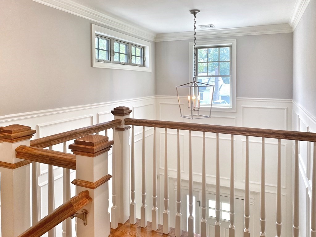 17 Barbara Road Newton, MA 02465 - Photo 18 of 40 a view of a porch with a table and chairs