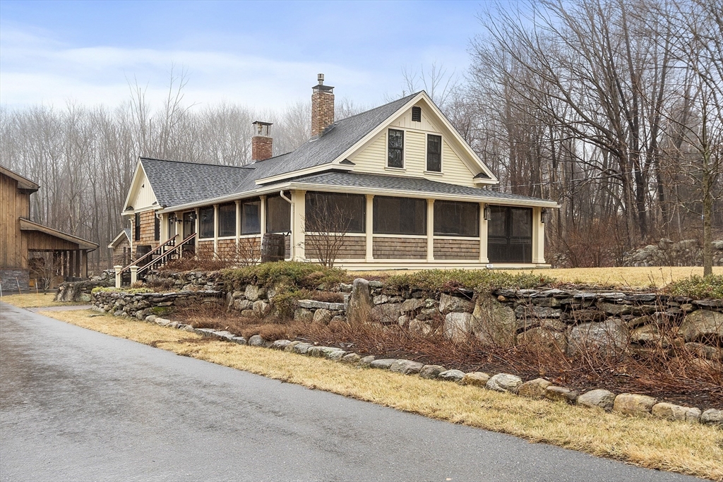 191 Damon Road Ashby, MA 01431 - Photo 2 of 42 a front view of a house with a yard