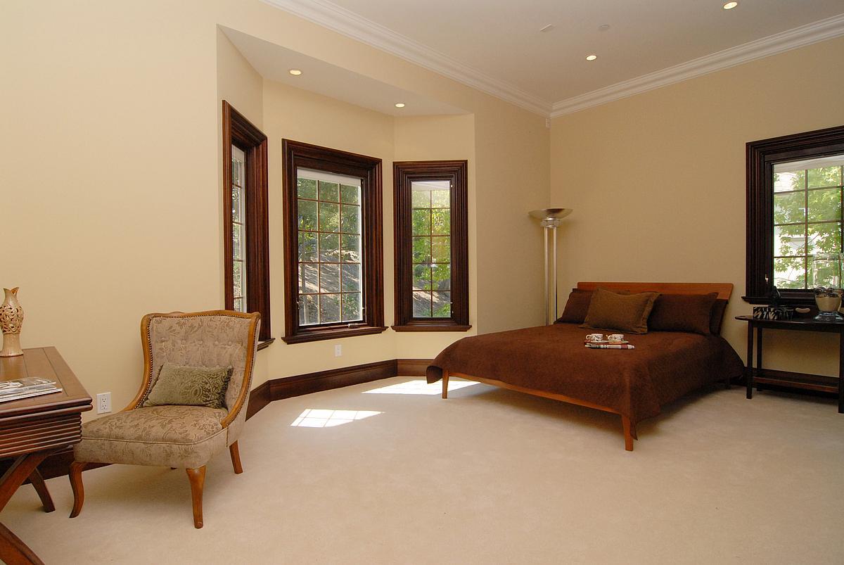 630 Pullman Road Hillsborough, CA 94010 - Photo 15 of 24 a living room with furniture and a large window