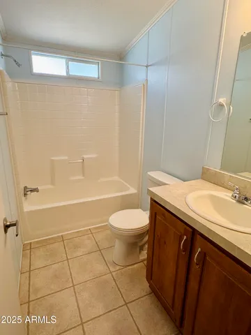 a view of a chairs and table on the balcony