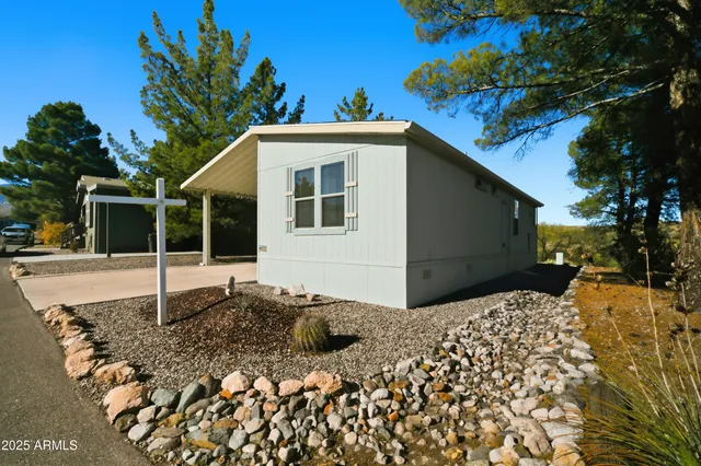 a kitchen with stainless steel appliances a stove sink and cabinets