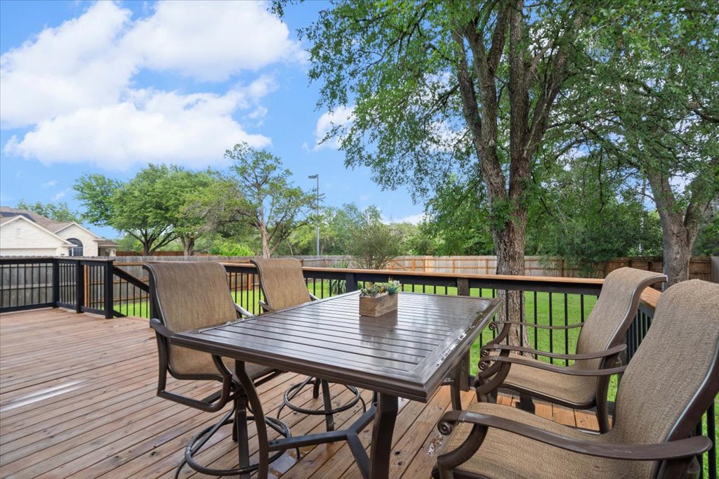 10801 Beachmont Lane Austin, TX 78739 - Photo 33 of 40 Sit back relax and unwind on your well-maintained spacious backyard deck!