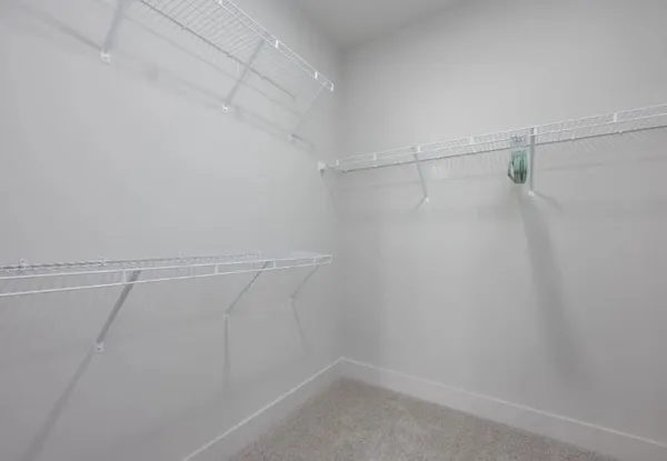 a view of a room with racks on the wall