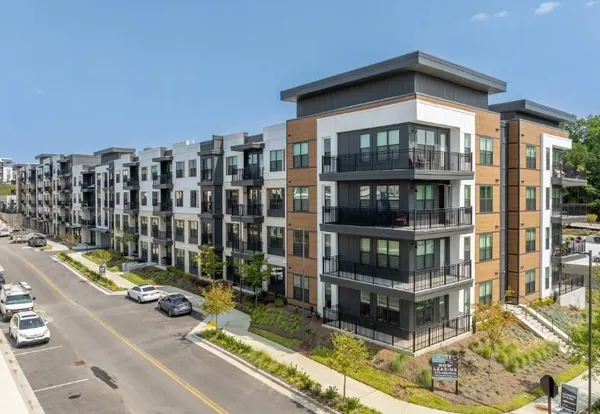 a view of swimming pool with outdoor seating