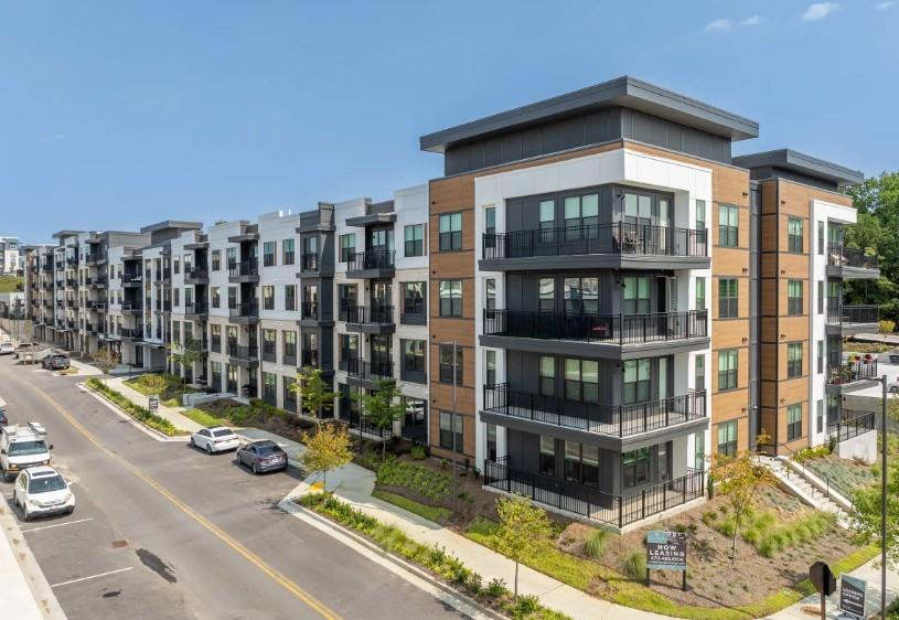 1400 Laurel Crossing Parkway Northeast, Unit 1105 Buford, GA 30519 - Photo 16 of 33 a view of swimming pool with outdoor seating