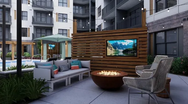 a outdoor living space with patio furniture and a fireplace