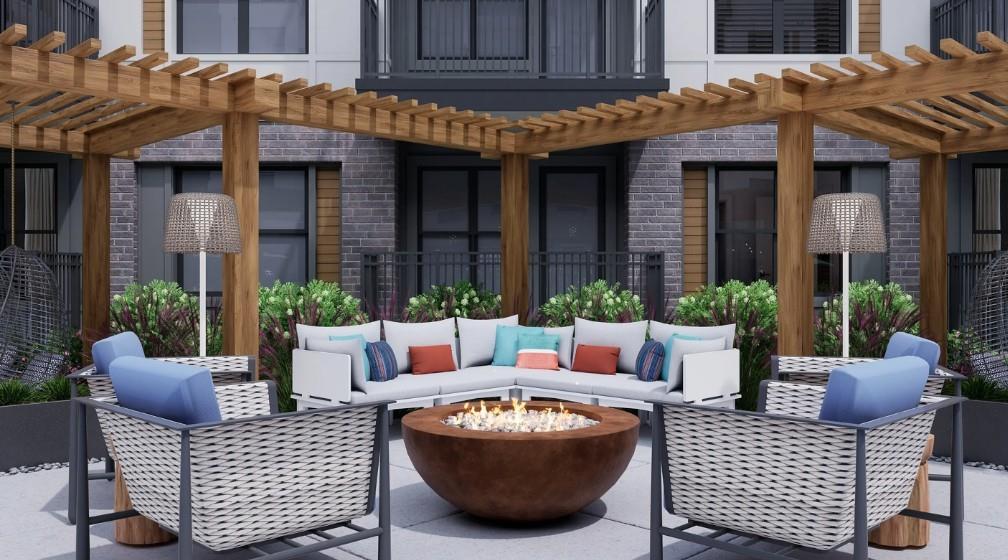 1400 Laurel Crossing Parkway Northeast, Unit 1105 Buford, GA 30519 - Photo 31 of 33 a view of a patio with couches chairs and wooden floor