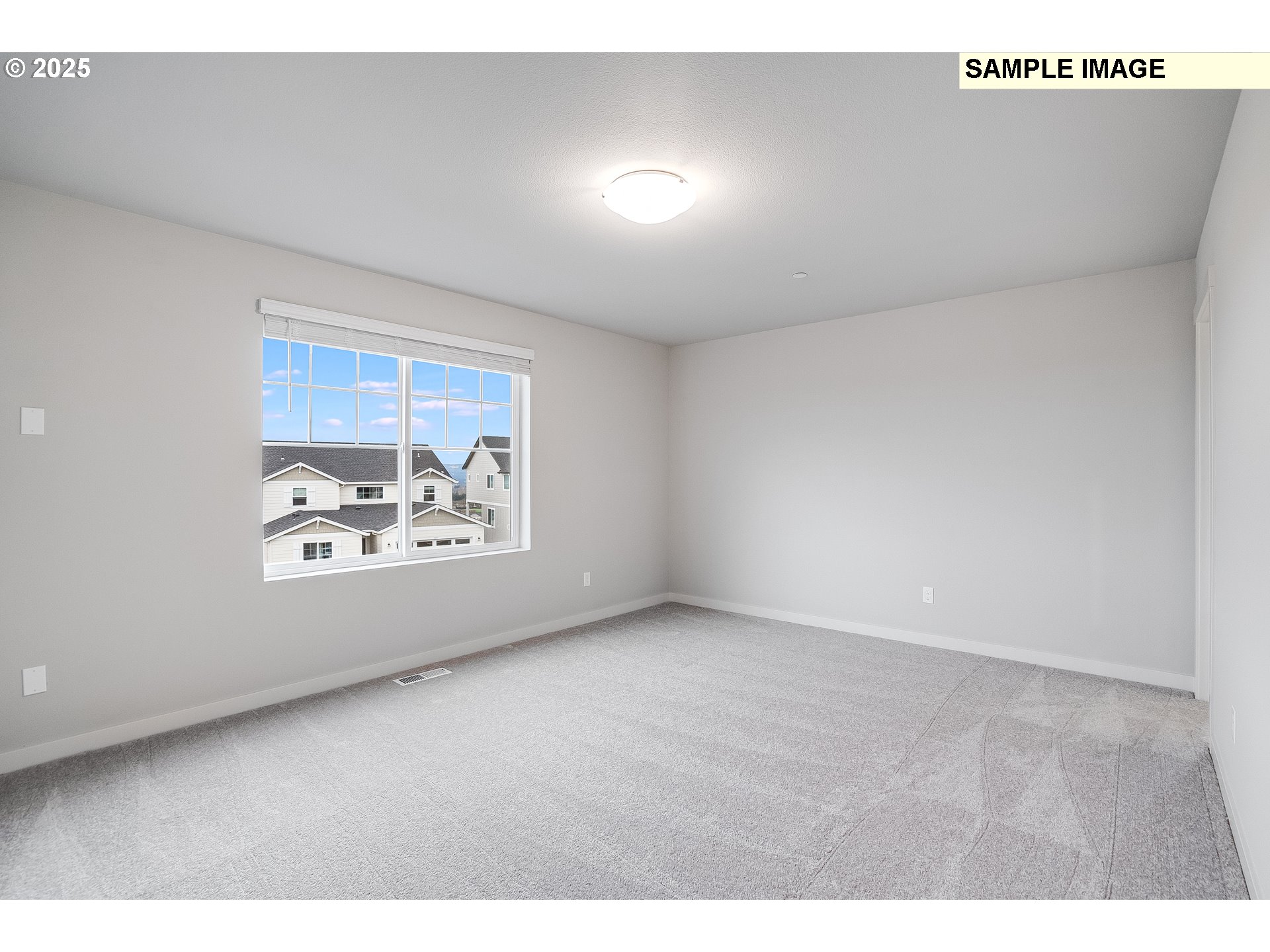 16921 Southwest Lorikeet Lane Beaverton, OR 97007 - Photo 11 of 23 a view of an empty room and window