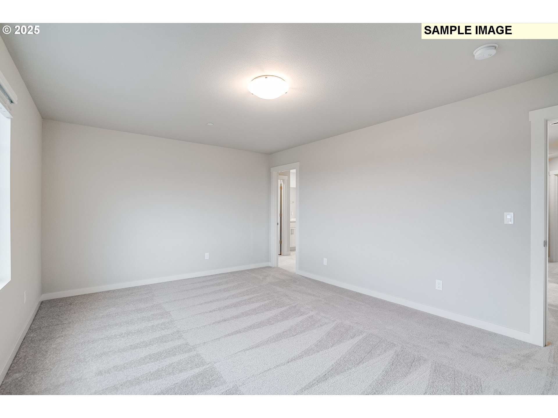 16921 Southwest Lorikeet Lane Beaverton, OR 97007 - Photo 14 of 23 a view of an empty room
