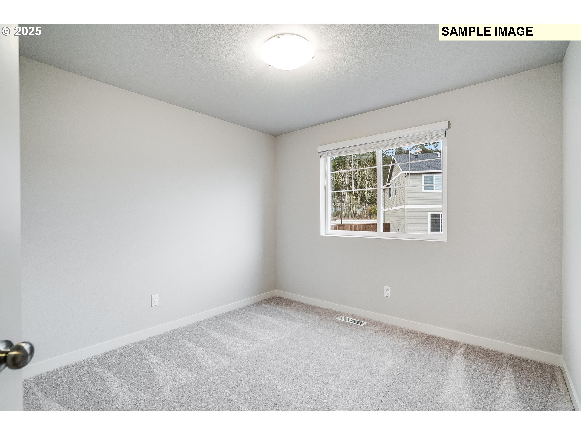 16921 Southwest Lorikeet Lane Beaverton, OR 97007 - Photo 23 of 23 an empty room with windows