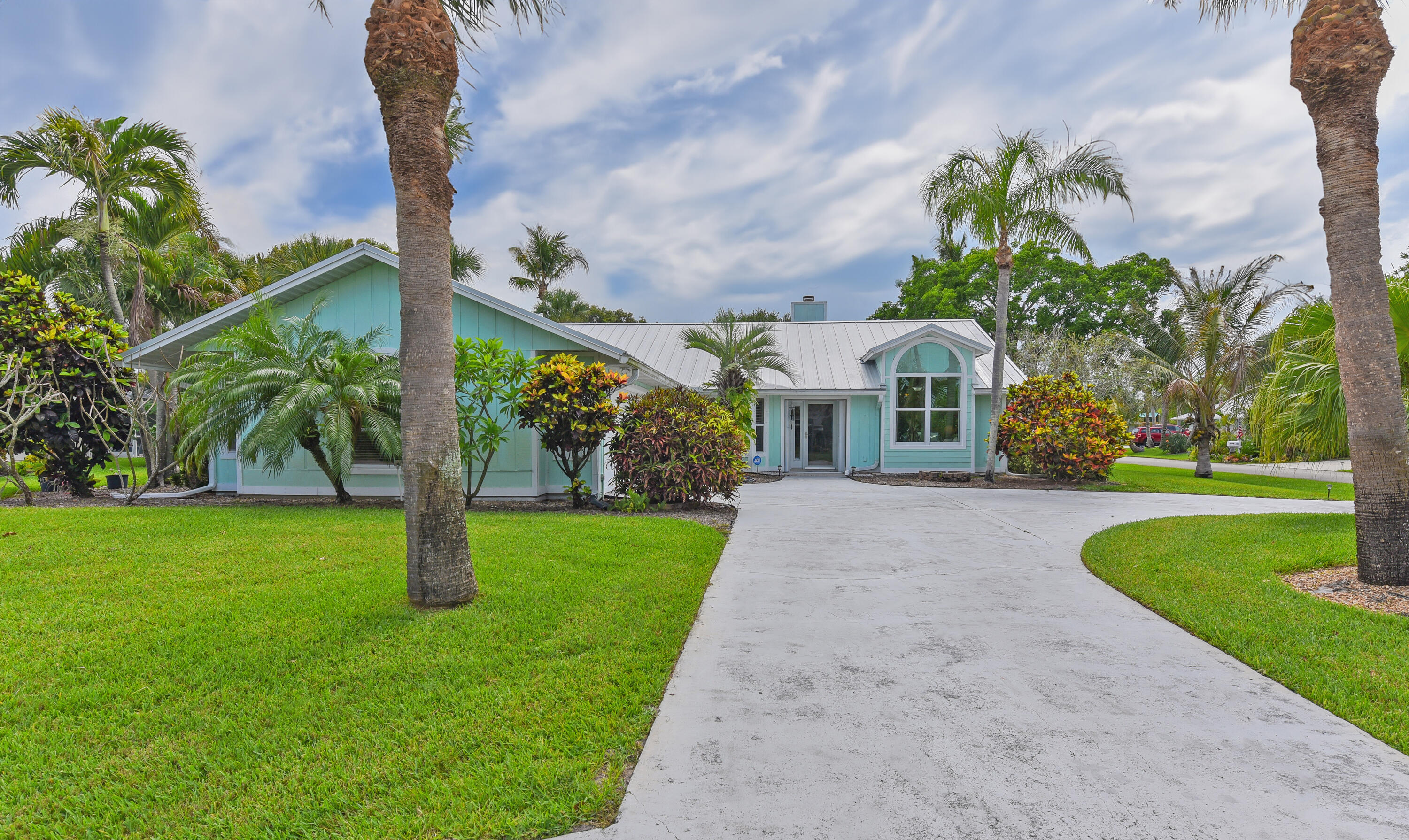 4240 Southeast Happy Lane Stuart, FL 34997 - Photo 3 of 39 Who wouldn't want to live on Happy Lane?