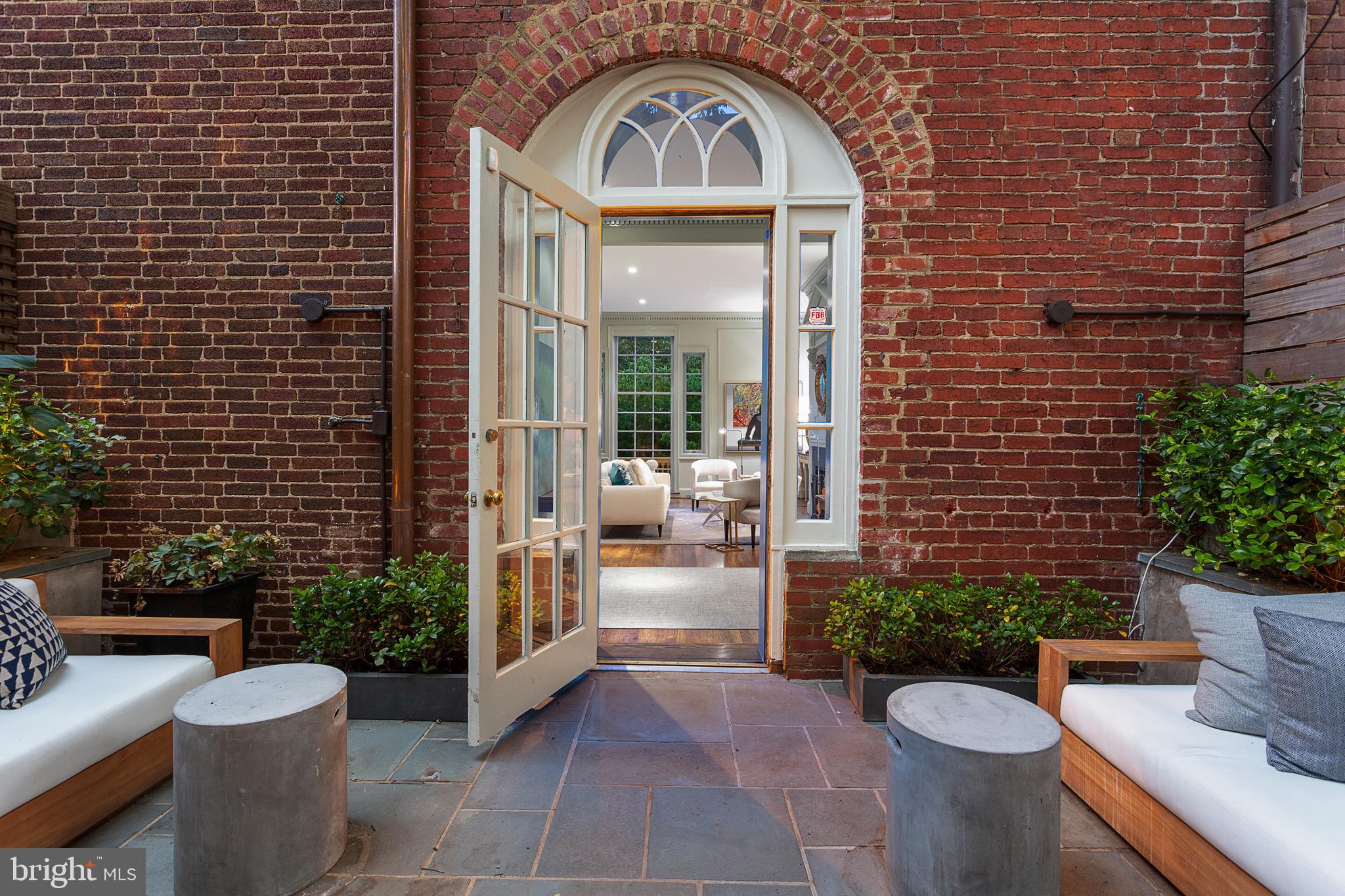 2103 R Street Northwest Washington, DC 20008 - Photo 34 of 36 Private Terrace in the Evening to Living Room