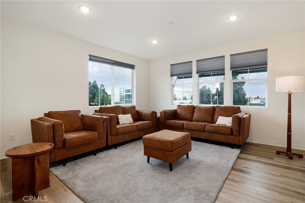 1380 Vigilant Carson, CA 90746 - Photo 13 of 43 a living room with furniture and a large window