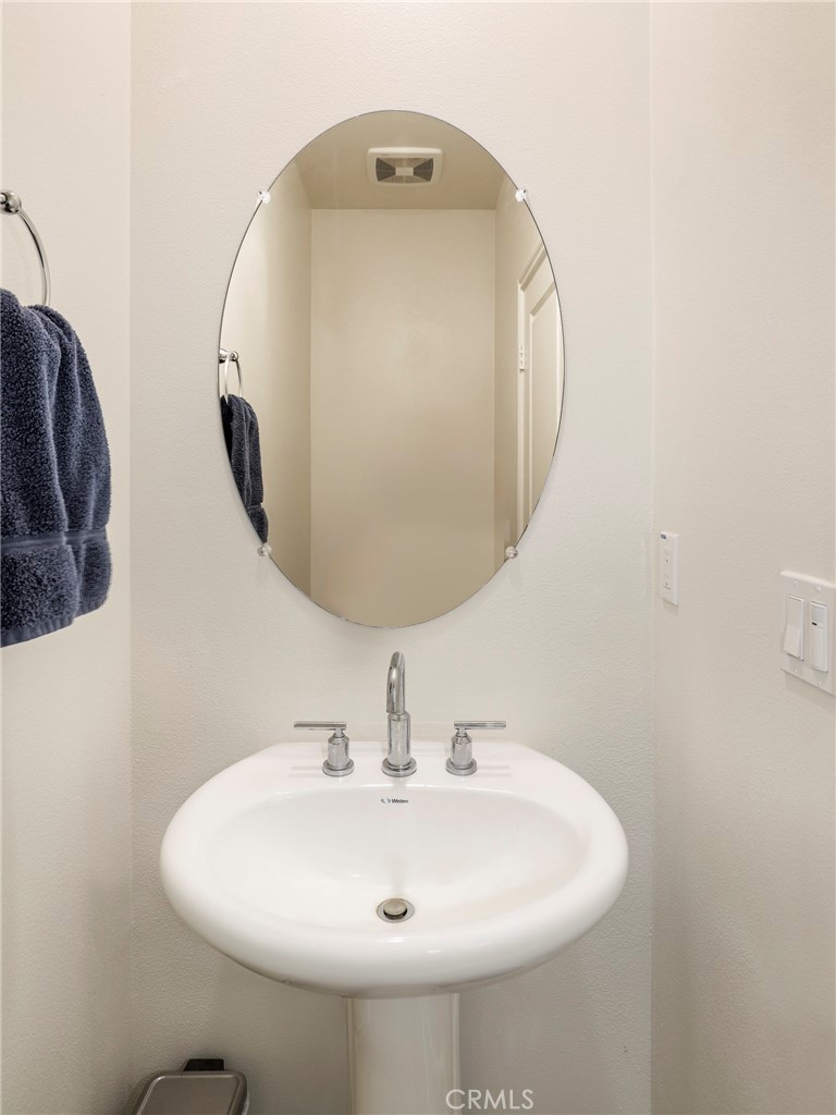1380 Vigilant Carson, CA 90746 - Photo 19 of 43 a bathroom with a sink and mirror