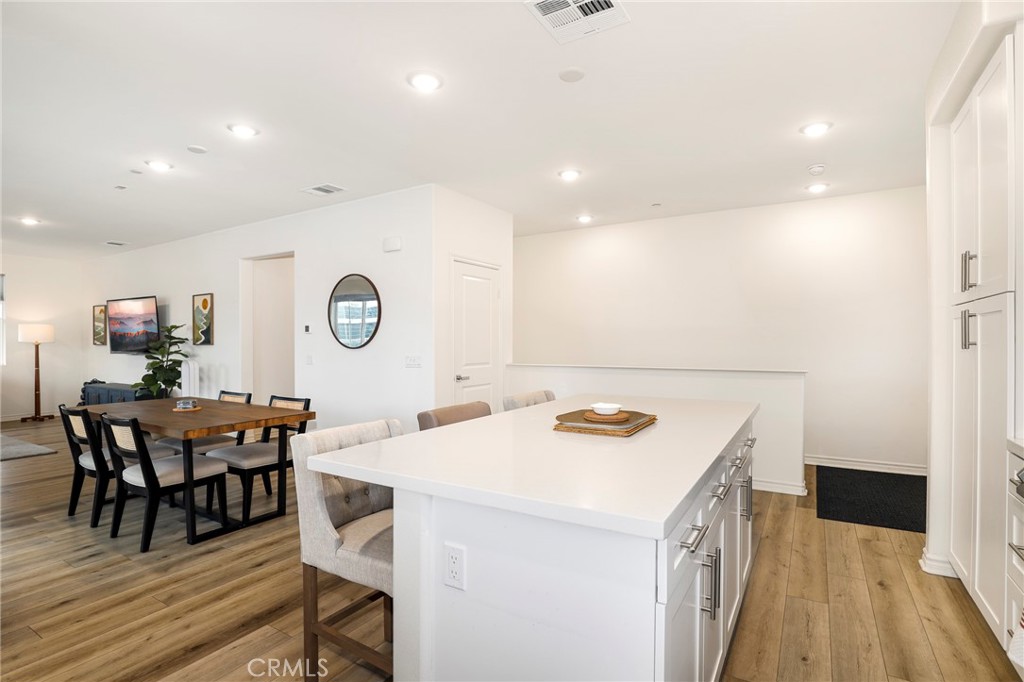 1380 Vigilant Carson, CA 90746 - Photo 2 of 43 a kitchen that has a table and chairs in it