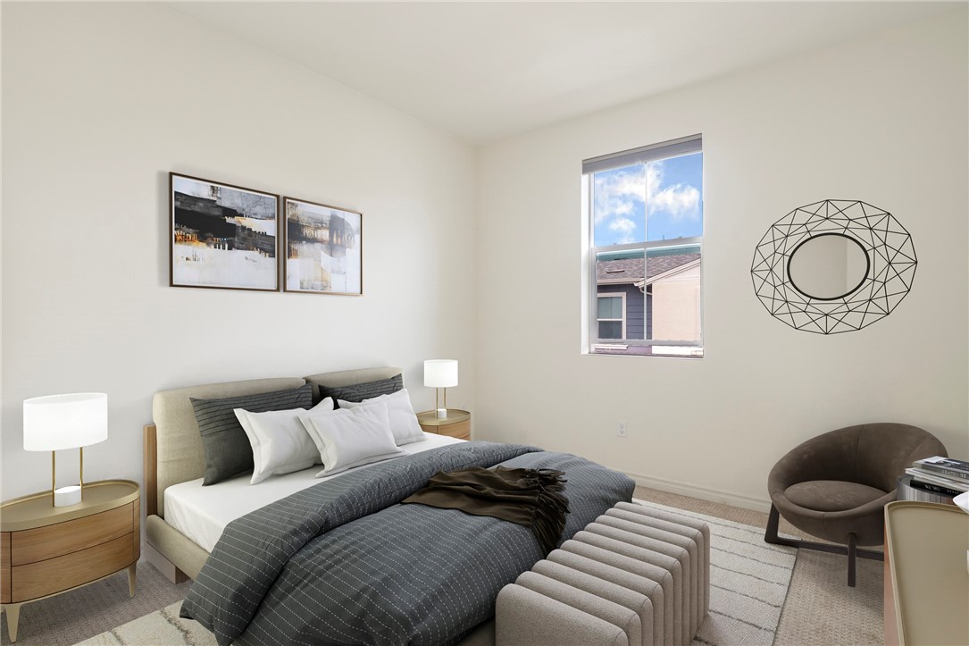 1380 Vigilant Carson, CA 90746 - Photo 25 of 43 a bedroom with a bed and chair