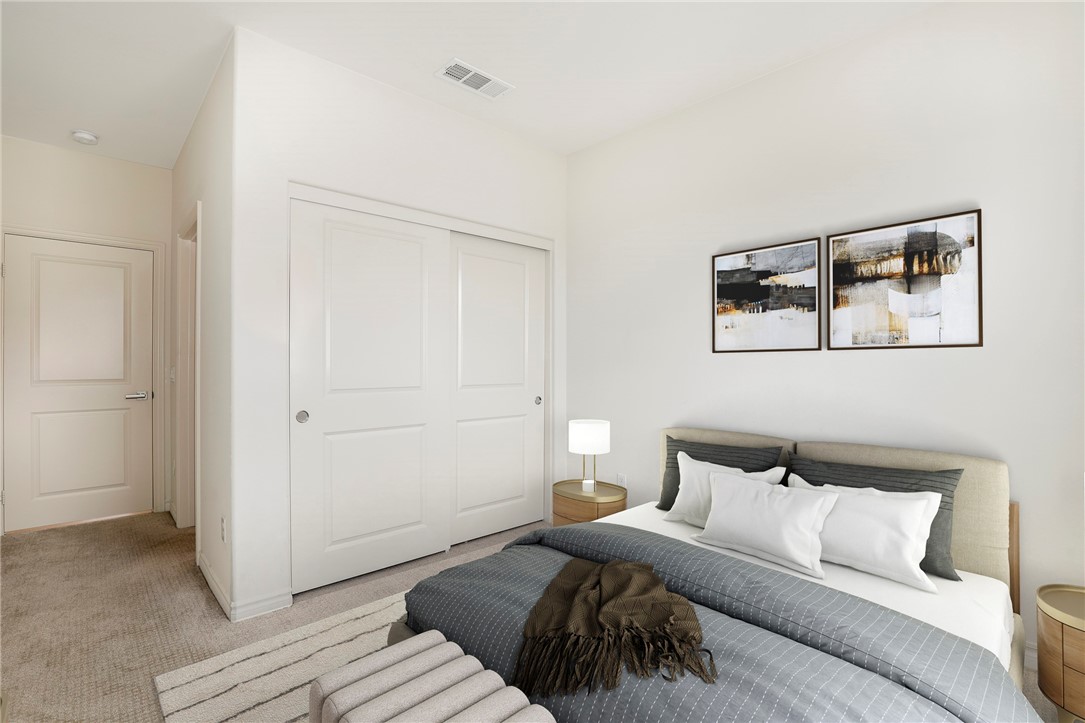 1380 Vigilant Carson, CA 90746 - Photo 26 of 43 a bedroom with a bed and a painting on the wall