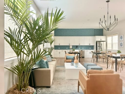 1380 Vigilant Carson, CA 90746 - Photo 36 of 43 a living room with fireplace furniture and a potted plant