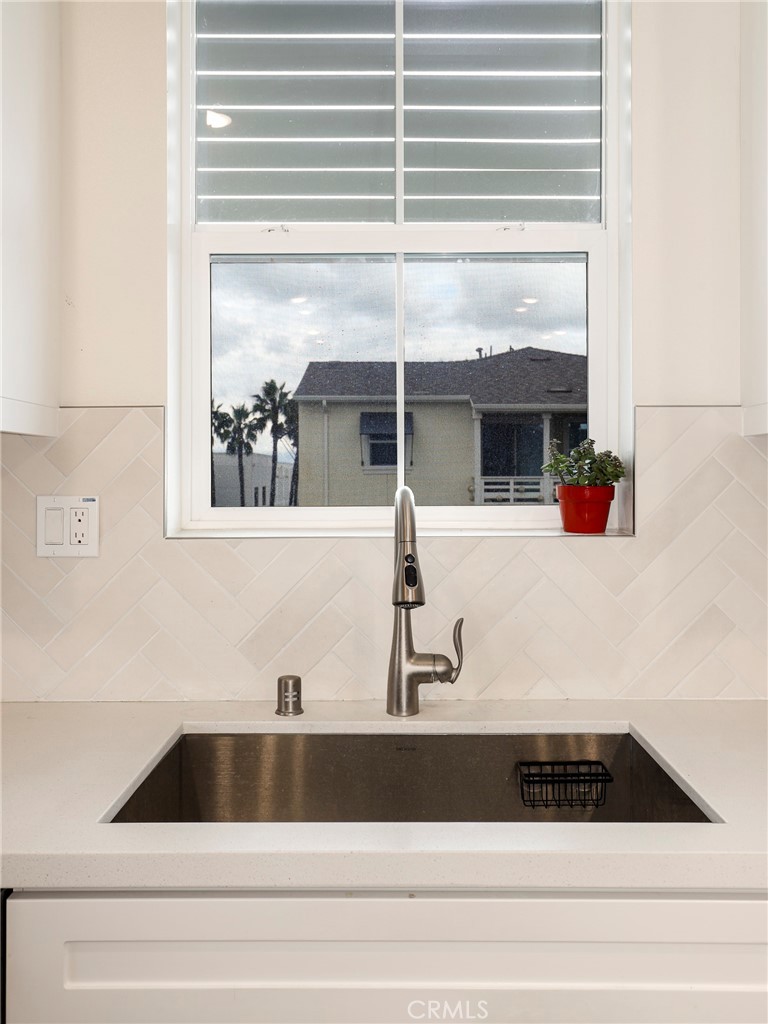 1380 Vigilant Carson, CA 90746 - Photo 6 of 43 a bathroom with a sink and a window