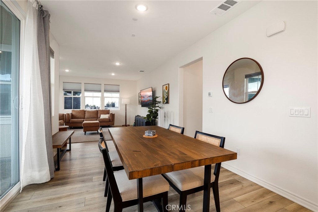 1380 Vigilant Carson, CA 90746 - Photo 7 of 43 a dining room with furniture and wooden floor