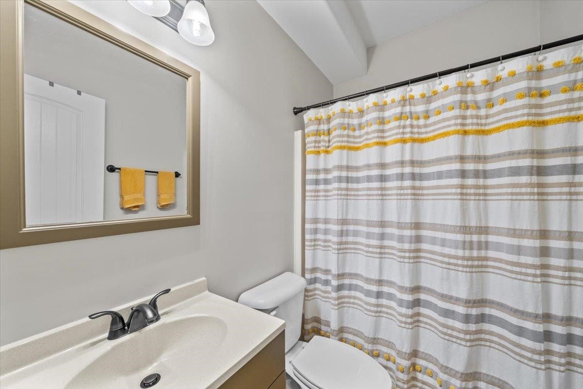 10470 Ashfarm Way Collierville, TN 38017 - Photo 12 of 15 a bathroom with a sink and a mirror